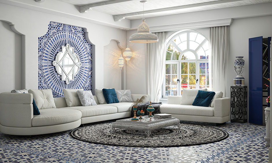 A spacious living room has a marble window frame designed in an arched shape