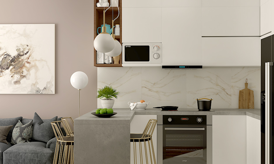 Grey marble kitchen table design integrated with the kitchen slab and paired it with stools