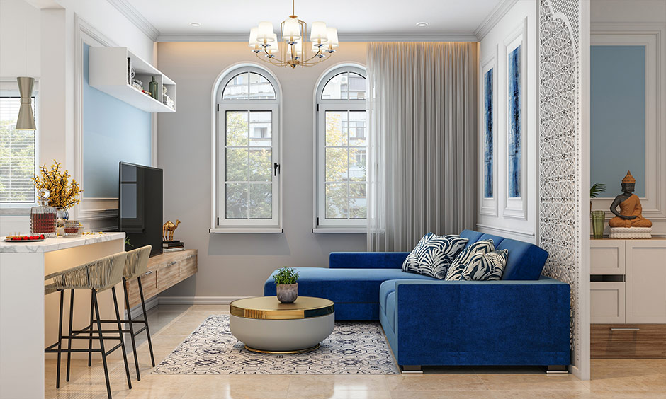 Two modern window frames featuring an arched design are incorporated into a small living room