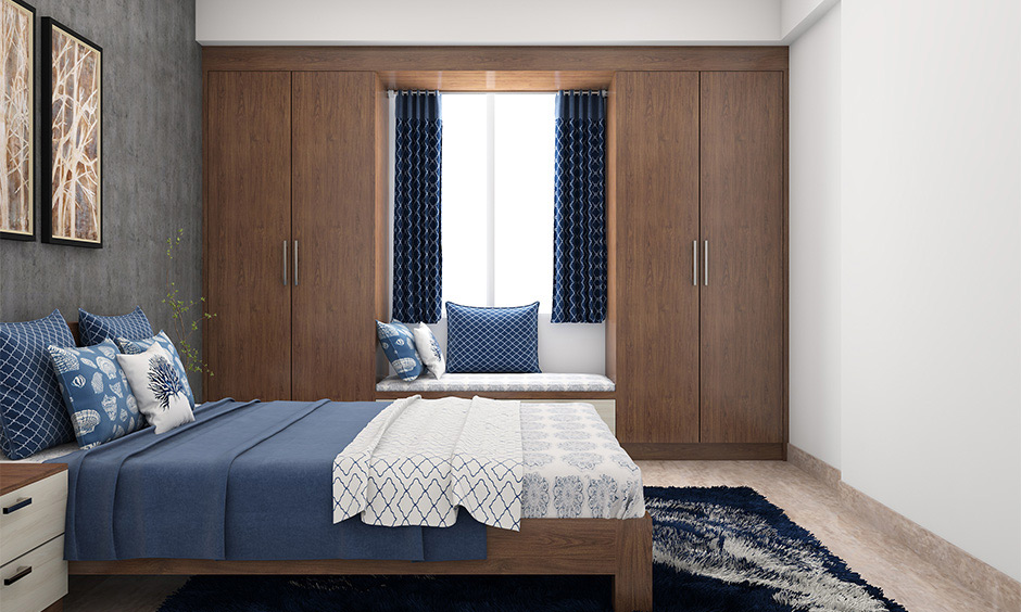 South indian interior style bedroom in white and matte grey colour