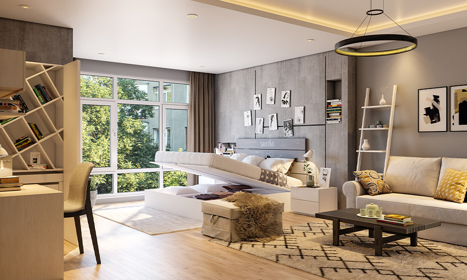 Studio apartment showcases a designer bedroom set featuring a modular bed with cleverly concealed storage