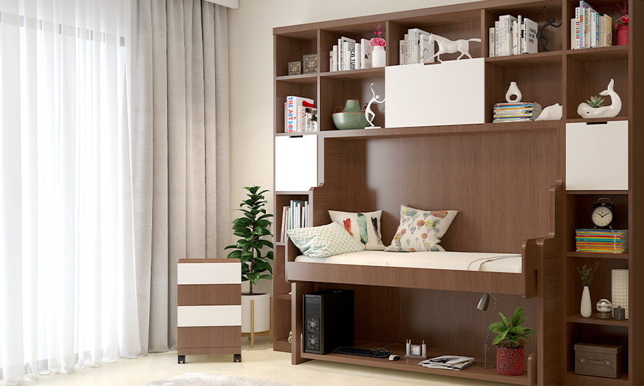 Contemporary reading room features a hidden sitting area concealed within the cupboards