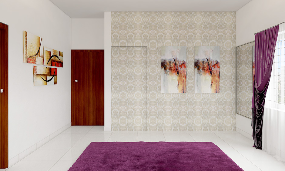 Hidden door design is incorporated into the surrounding wallpaper and artwork, making it virtually invisible