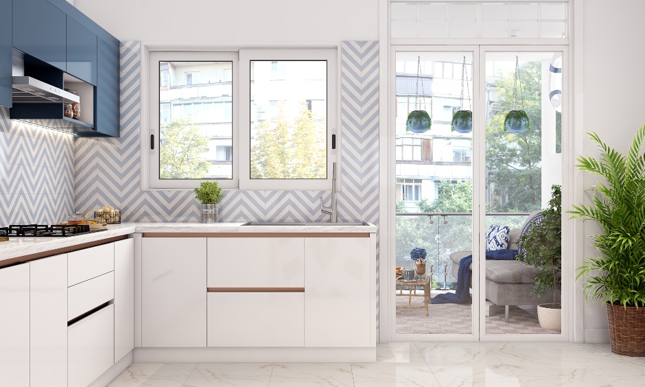 An L-shaped Kitchen In Serene White And Bold Navy - DesignCafe