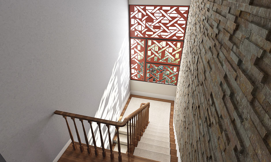 Metal jali window for staircase design serves as a stunning centrepiece