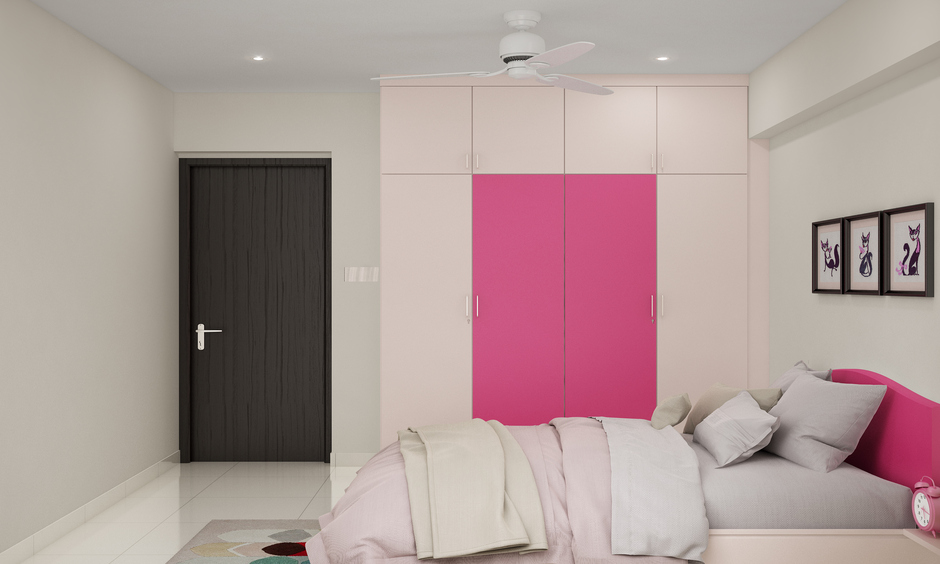 Bedroom door laminate design in dark brown colour which complements the wardrobe