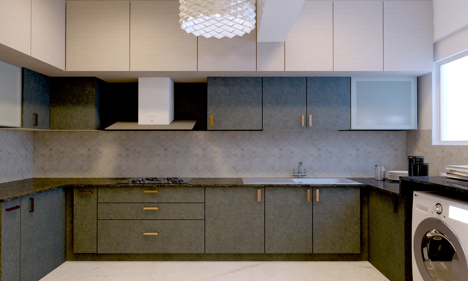 Copper kitchen cabinet handles bring a formal yet contemporary vibe