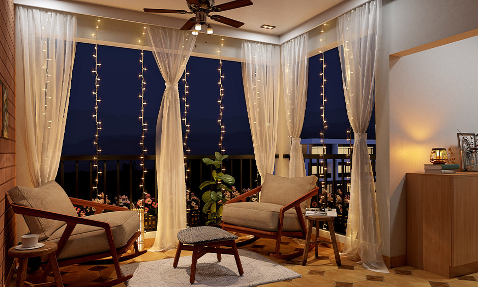DIY balcony makeover with full-length sheer white curtains protects from harsh sun rays
