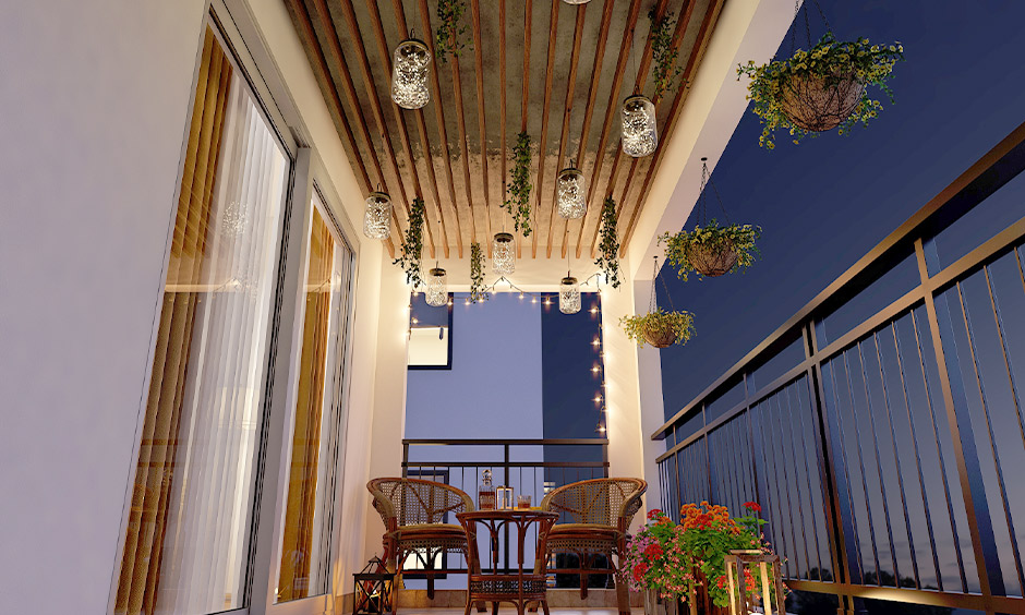 DIY craft idea for apartment balcony decor: Mason Jar lanterns with fairy lights and leaf vines