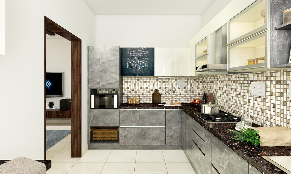 Stainless steel as a kitchen cabinet material is a durable and water resistant option