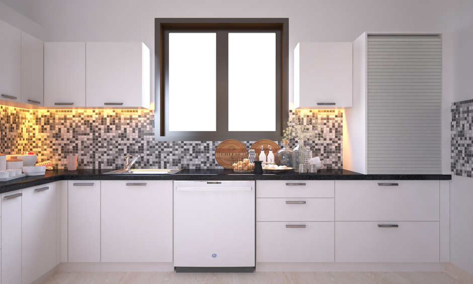 Monochrome mosaic kitchen tiles on the backsplash showcase unique style and personality