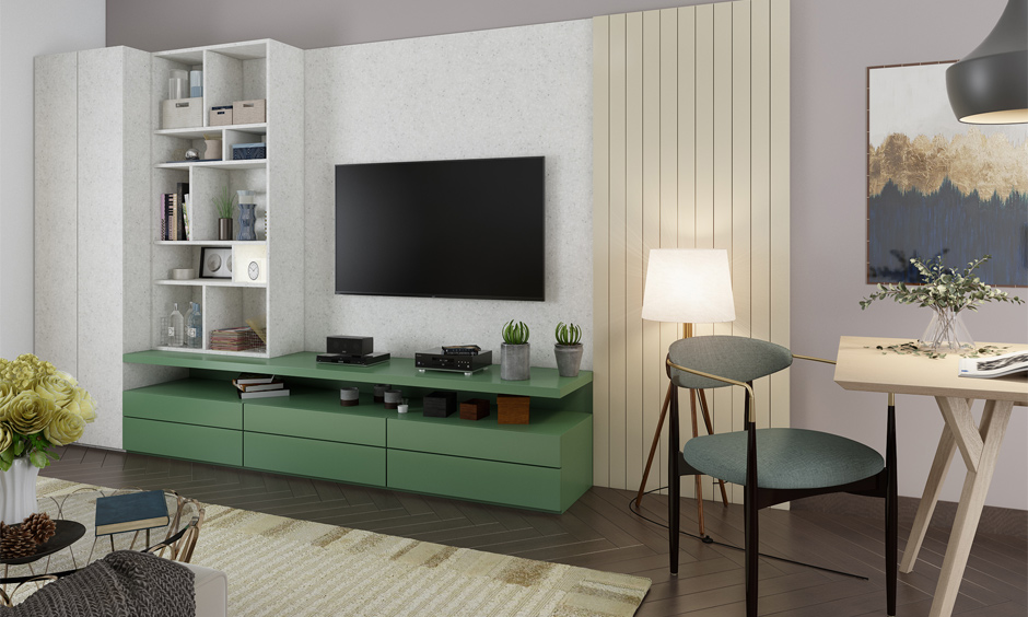 Small drawing room design with wall mounted shelves and cabinets