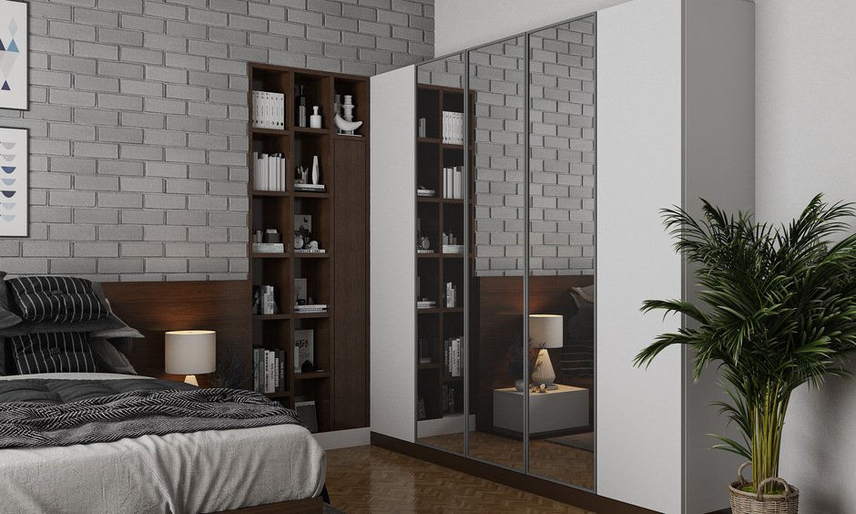 Mirror wall panel design on wardrobe for a spacious feel