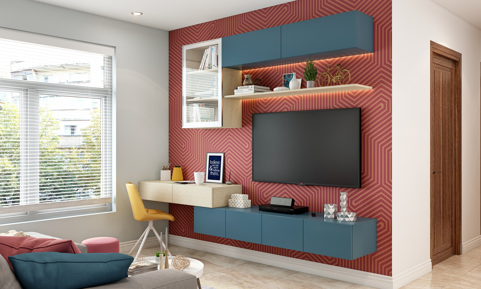 Space-saving interior design for small bedroom with a TV unit that doubles as a study table