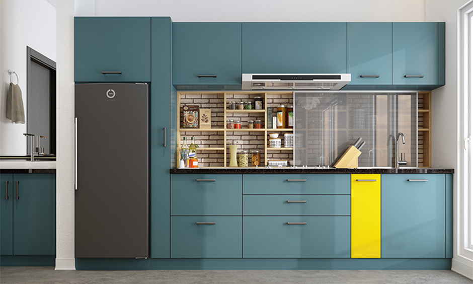 White-washed brick wall-styled dado tiles in the kitchen exude an industrial vibe