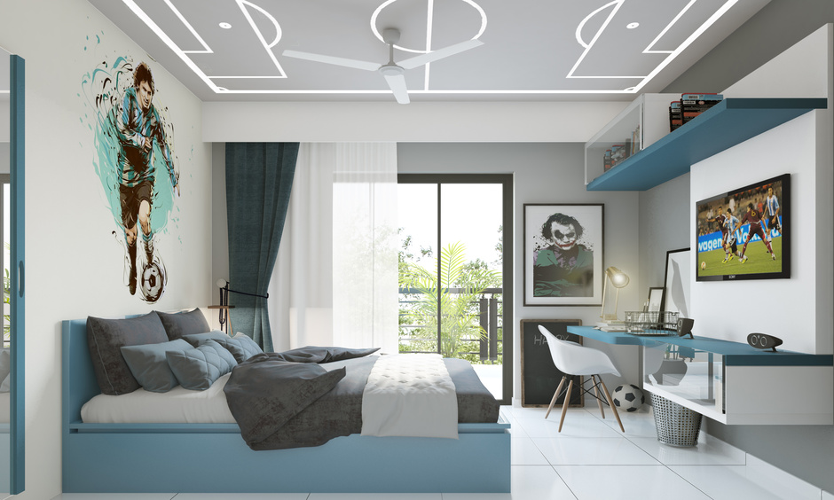 Football inspired false ceiling design for a small bedroom with a fan