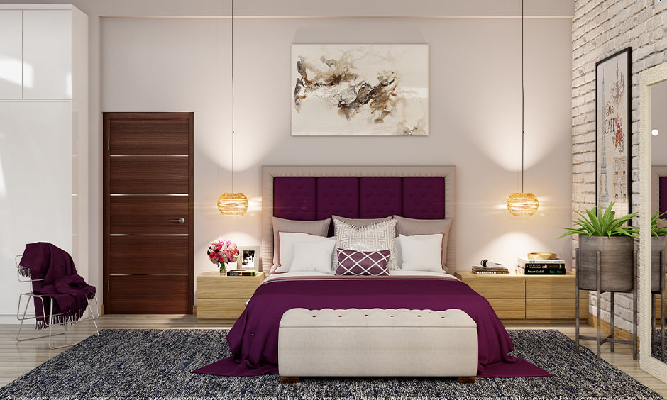 Purple bed with two pendant lights above it creates an aesthetic purple bedroom