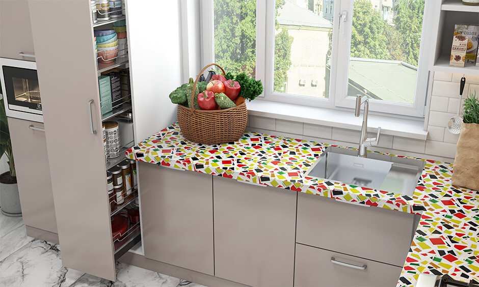 A vibrant kitchen slab design in India, set against a subdued backdrop, creates an eye-catching visual