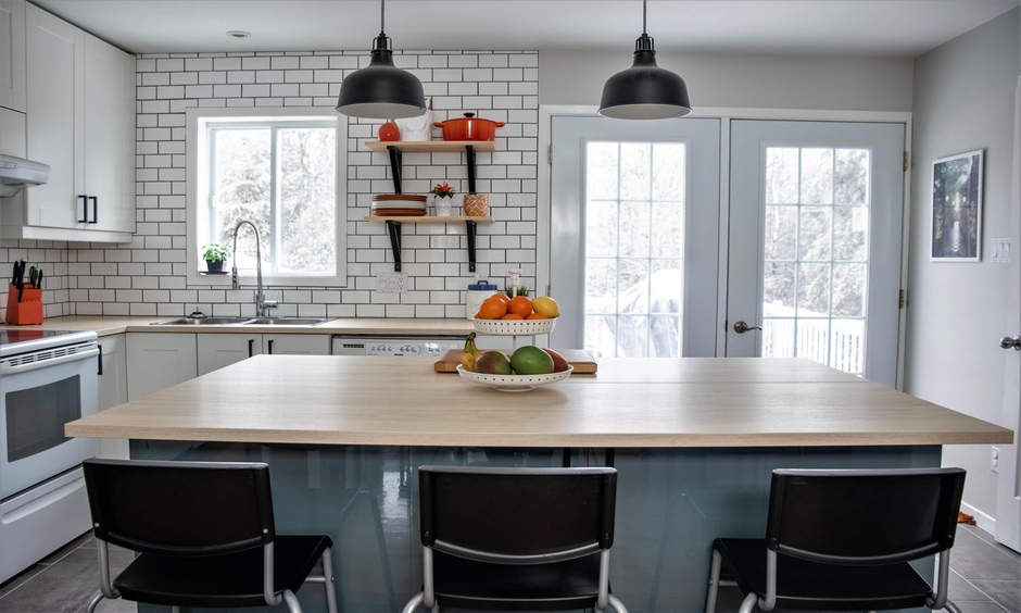Modular kitchen wooden slab design with a sleek finish and ample storage space