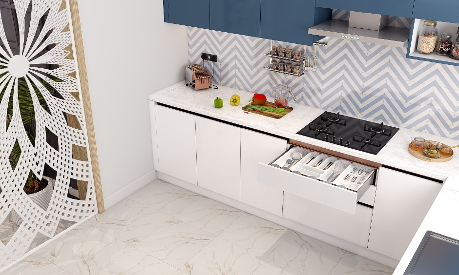 Kitchen pull-out baskets with a cutlery tray for better organisation of the space