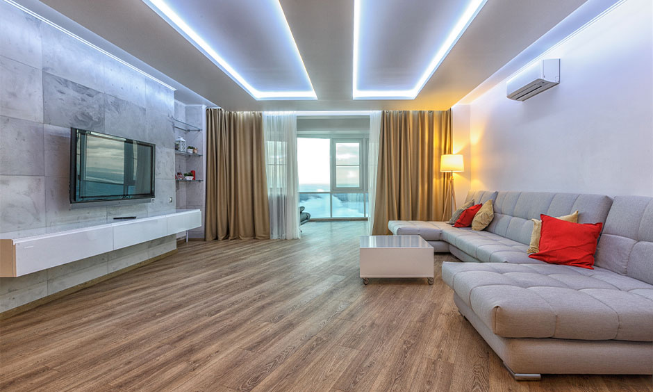 Modern living room with light grey pop colour combination and white lights