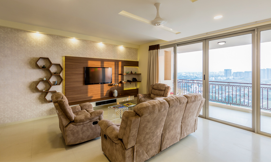 Suede fabric for a three-piece sofa set which complements the wooden elements in the room