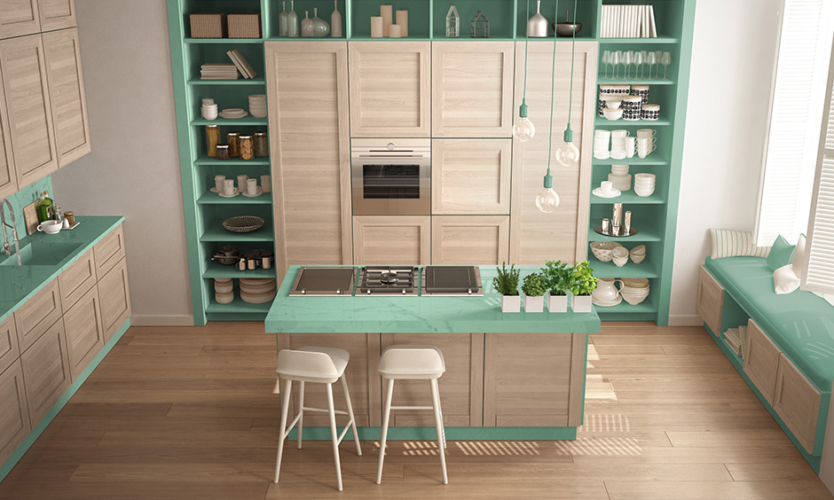 Aquamarine green and white kitchen cabinets which embody the calm colours of the beach