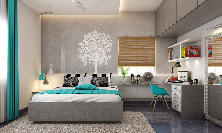 Bedroom's modern wall stencil portrays a beautiful white tree design against a grey wall