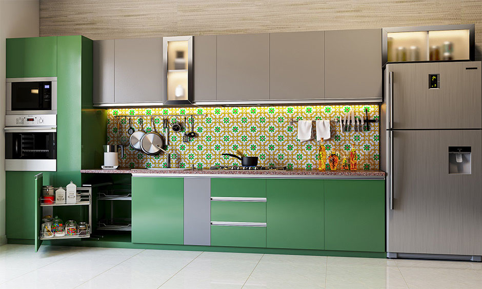 Emerald green kitchen cabinets which infuse a sense of opulence