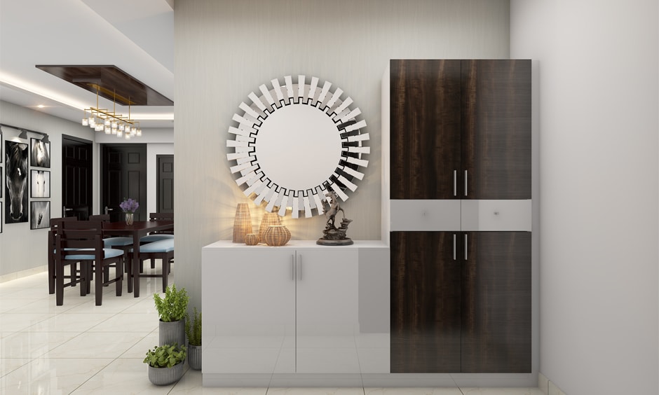 Off-white wall decor with a mirror to add a touch of luxury