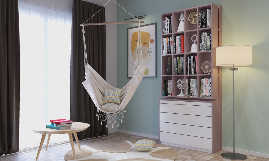 Bohemian-themed reading nook interior with a swing chair creates a cosy and inviting space