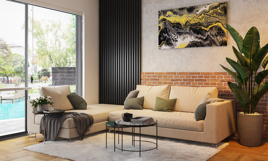 Drawing room wall colours in black, beige, and red combinations infuse a natural ambience into space