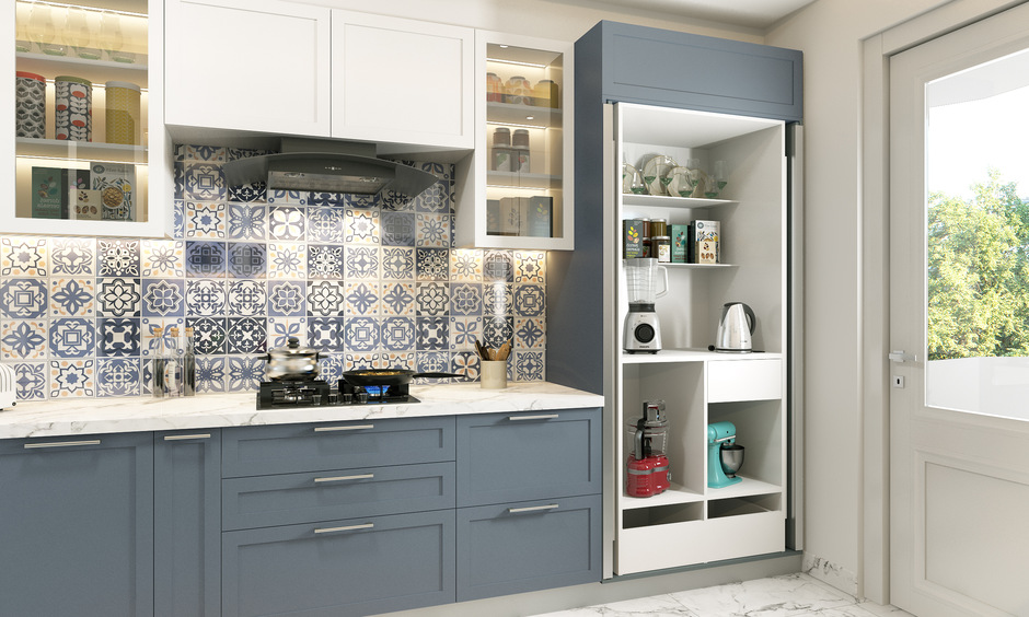 Modular wall-mounted crockery unit with glass shutter prevents oil spillage on fine china.