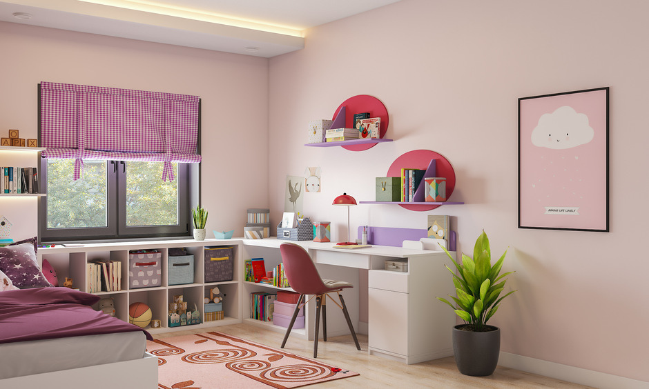 Floating shelves in bedroom are placed against pink circles, bringing a playful touch to the space