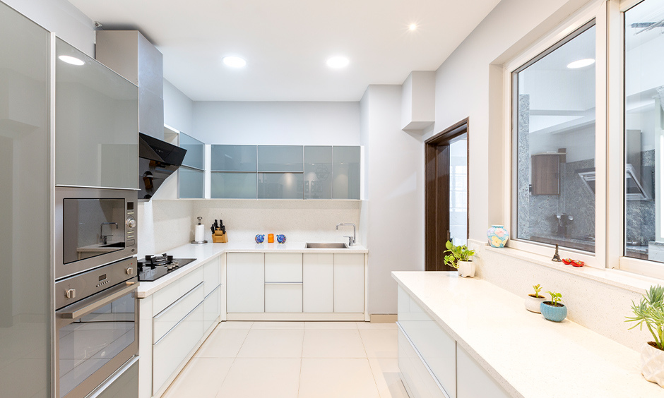 Quartz vs granite kitchen countertops: Both are durable surfaces resistant to scratches, stains, and impact.