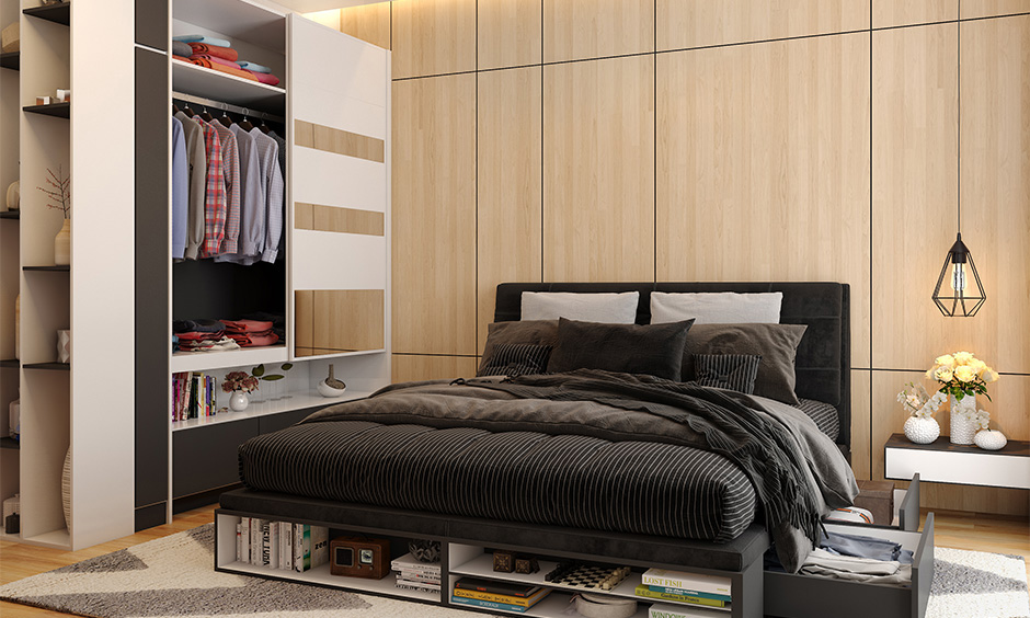 Bed with book storage underneath in the form of open sectional slots