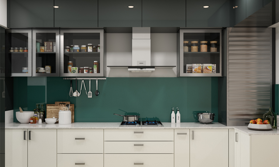 A contemporary kitchen with black lacquered glass cabinets perfectly complements the white lower cabinets