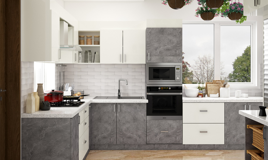 Lacquered glass kitchen is in neutral tones, exuding minimalist charm