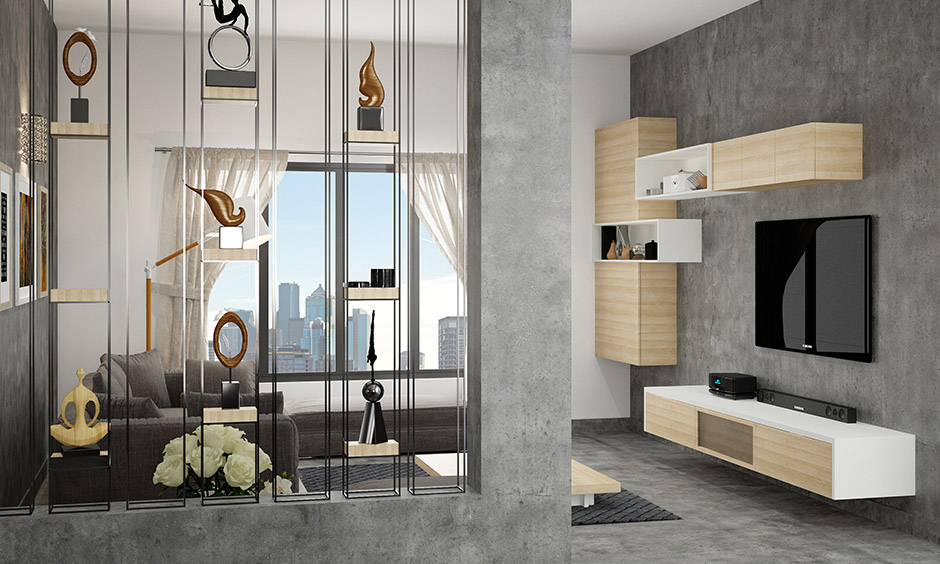 Modern living room partition ideas incorporate a metal divider enclosed in a cement frame for an industrial look