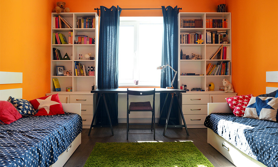 Orange bedroom ideas for kids' room with ample storage space