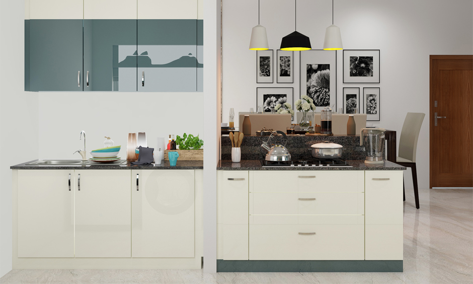 Teal green and white lacquered glass kitchen exudes luxury and sophistication