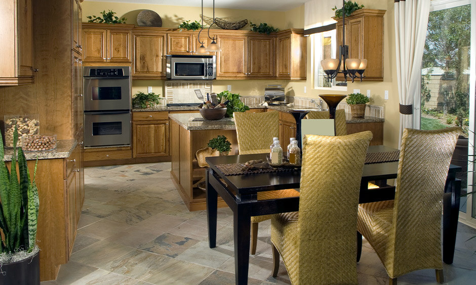 Kitchen floor tiles made of natural stone mimic the real deal while adding texture and personality