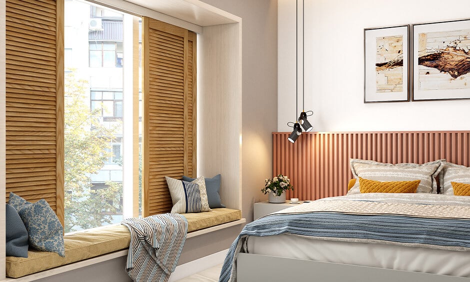 Small bedroom layout features cosy bay window seating