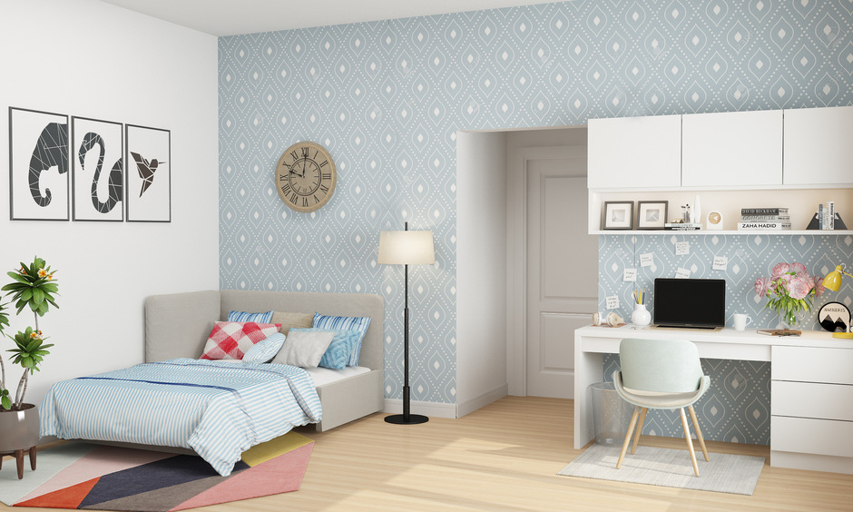Small grey sofa for bedroom doubles as a sleeper chair for guest room