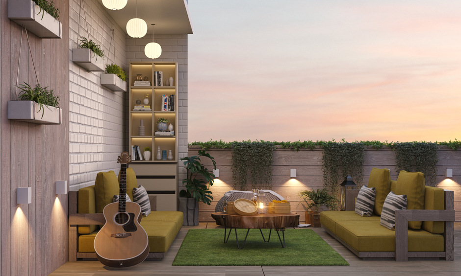 Terrace lounge with artificial grass walls, creating a natural outdoor ambience