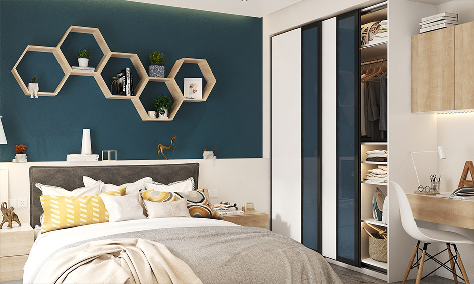 Beehive-inspired wall shelf design that elegantly adorns the bedroom wall