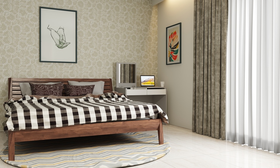A dark brown teak wood bed