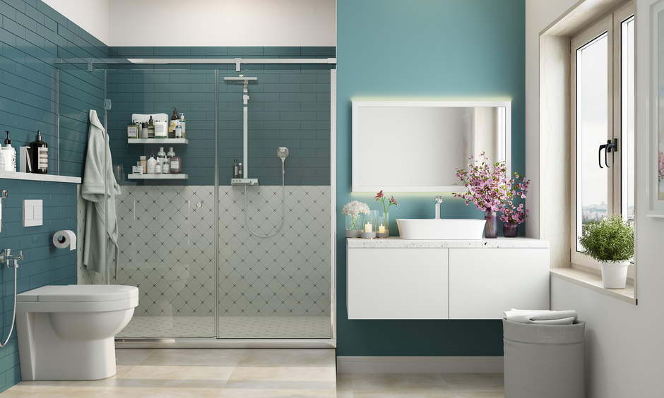 A dual-toned walk-in shower design for small bathroom featuring a glass door