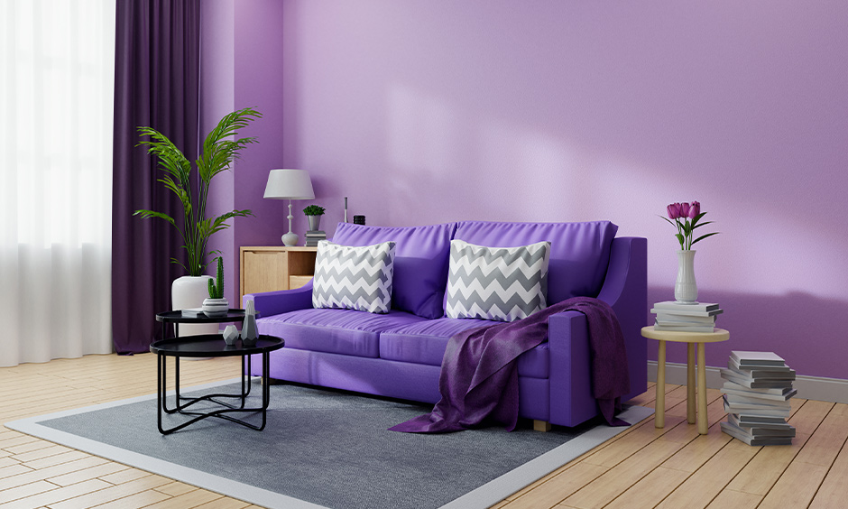 Tones of purple, two-colour combinations for drawing room walls, paired with light wood tones and floral accents