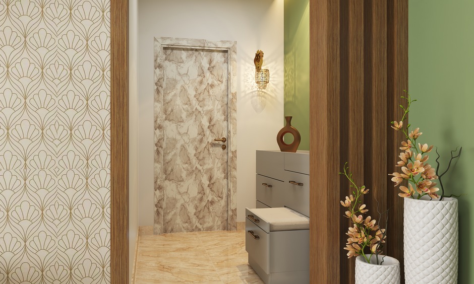 A modern entryway highlights an abstract sunmica flush door as a striking focal point